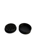 Black 3D printed round storage container with divided lid